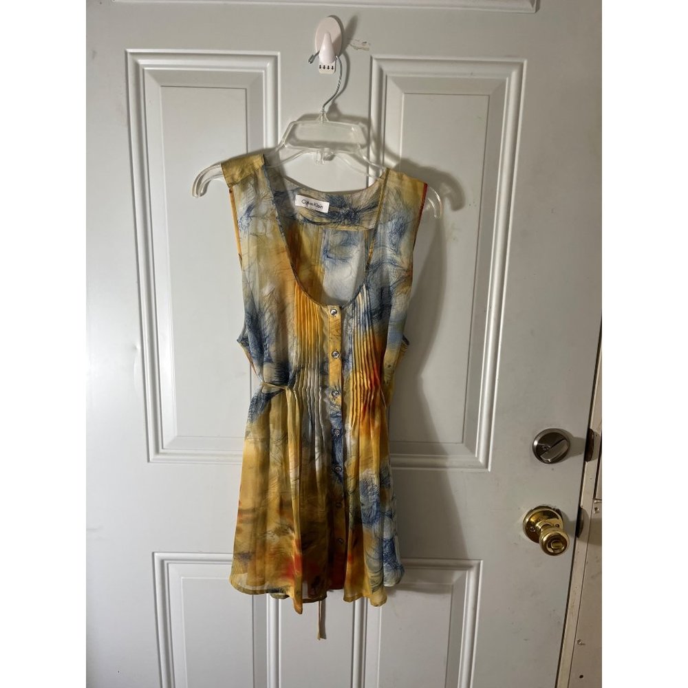 Calvin Klein sheer sleeveless button front top with tie in back